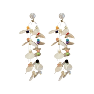 Handmade boho vacation style tassel earrings with pearls and colorful beads