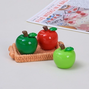 Miniature resin red and green apples in a tiny woven tray for creative DIY crafts
