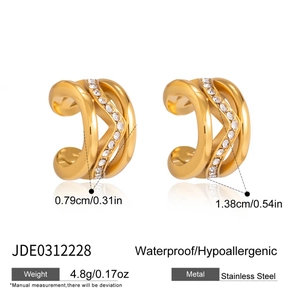 Detail view of gold wave rhinestone ear cuffs with product weight and size specs