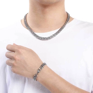 Elegante conjunto de collar y pulsera de cadena cubana de acero de titanio para hombre