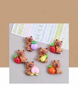 Macro detail of resin bear DIY accessories with fruit and vegetable designs