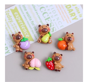 Five resin capybara charms holding fruits for DIY cream glue hair clips and accessories
