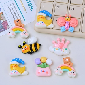 Accessori fai-da-te in resina colorata con orsi arcobaleno e api per decorare custodie