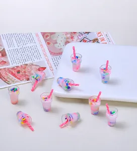 Macro shot of colorful miniature bubble tea cup resin accessories for DIY craft hair clips
