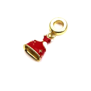 Close-up of a red enamel dress charm with gold stars for beaded charm bracelets
