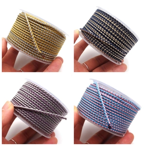 Macro detail of 2.8mm multi-color braided nylon cord rolls for DIY jewelry making