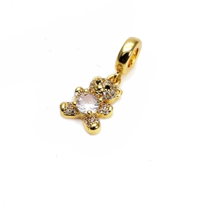 Detail of a gold bear pendant with micro-inlaid cubic zirconia for charm bracelets