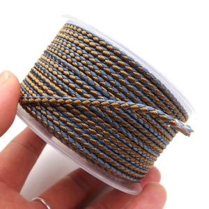 Golden brown and grey blue 2.8mm braided twisted cord for DIY jewelry on a clear spool