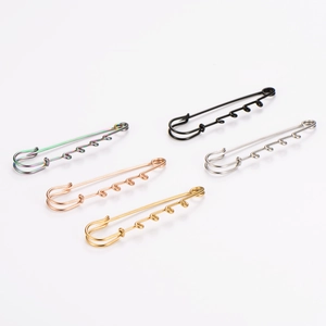 A variety of 4-loop metal safety pins shown in five different colors for DIY jewelry decoration