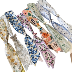 Colorful floral skinny scarves for women with decorative slides and polka dot patterns