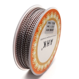 Detail of 1.5mm two-tone dragon pattern braided cord on spool for DIY jewelry making