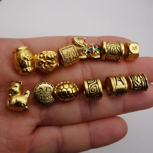 Gold-plated Pixiu and Fortune Cat charms with enamel details for jewelry making