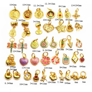 Detailed view of various gold-plated DIY charms with colorful enamel and precise dimensions