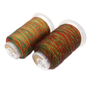 Spools of gradient 6-strand waxed cord in Starry C51 and C56 colors for DIY weaving