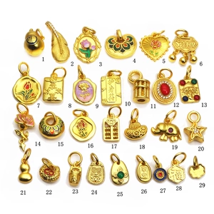 Assorted gold-plated enamel charms collection featuring various traditional Chinese designs