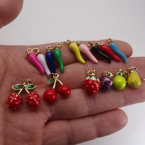 Colorful enamel fruit and vegetable charms in strawberry cherry and chili pepper shapes