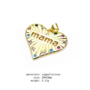 Macro shot of 26x23mm heart MAMA pendant with colorful zircons on gold-plated brass