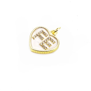 Close-up of gold heart pendant with FE lettering in micro-set zircon over white enamel