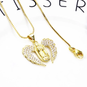 Detail of gold plated Virgin Mary pendant necklace with micro-pave zircon angel wings