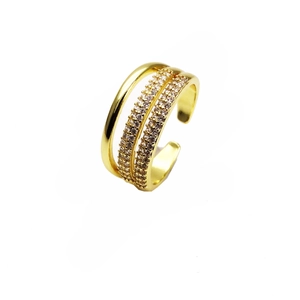 Detailed view of adjustable triple-layer gold ring with pavé micro-set cubic zirconia stones