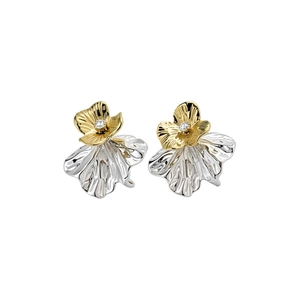 Elegant two-tone flower stud earrings with central sparkling stone and silver needle