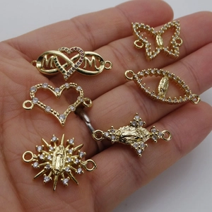 Golden micro-pave zircon charms featuring butterfly, heart and religious Maria motifs