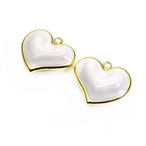 Golden heart-shaped charms with pearly white inlay and closed rings for DIY jewelry
