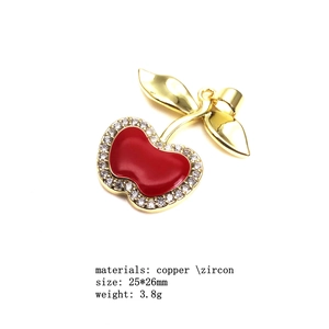 Gold plated copper apple pendant with red enamel and pavé cubic zirconia stones