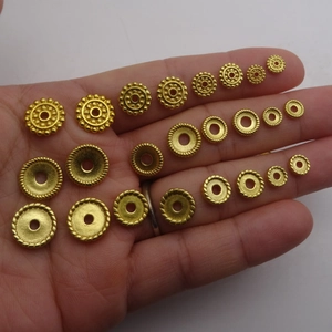 Flat spacer beads in gear and rope patterns for DIY jewelry making in gold plating