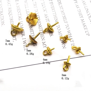 Detail of matte gold teardrop bead caps in various sizes for DIY jewelry making
