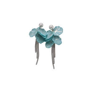 Elegant silver needle drop earrings featuring blue petals and long tassels with pearl accent