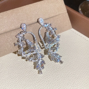 Elegant French birdcage drop earrings with full diamond pavé and silver needles.