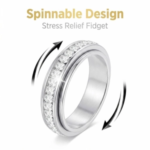 Close-up detail of the spinnable titanium ring with a single row of sparkling diamonds