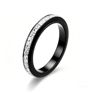 Close-up of black titanium steel ring with sparkling single row crystal inlay finish