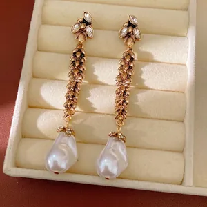 Vintage golden wheat leaf drop earrings with white baroque pearls and crystals.