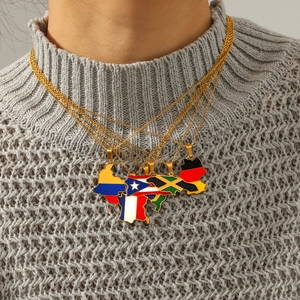 Close-up of world map pendants with national flags on gold stainless steel chains.