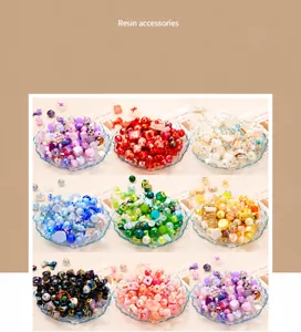 Macro shot of colorful plated acrylic resin beads in various shapes for DIY jewelry making