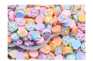 Macro shot of colorful resin DIY craft accessories in macaron shades for handmade jewelry