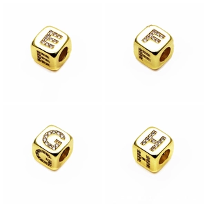 Close-up of 6mm gold micro-pave zircon cube beads with letters E F G H for DIY jewelry