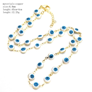 Goldene Kupferhalskette mit blauen 6,8mm Evil Eye Perlen und 45cm langer Kette