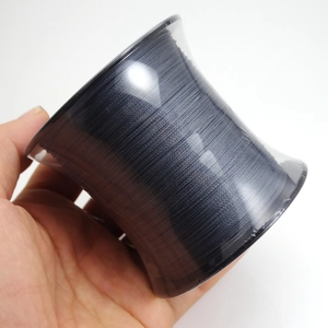 Strong black non-elastic pearl stringing thread on a clear plastic spool for DIY jewelry