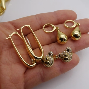 Three-set 18K gold plated U-shape hoops, teardrop earrings, and pearl bear stud earrings