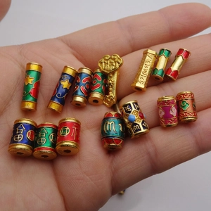 Gold-plated enamel beads with traditional patterns and blessing symbols for DIY jewelry