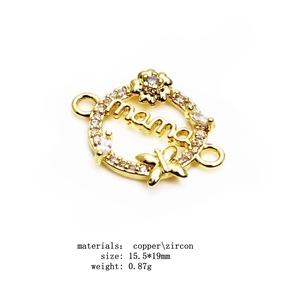 Macro detail of gold plated mama connector with zircons for DIY jewelry making