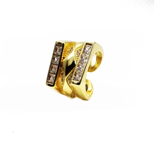 Close-up of a 14k gold-plated open ring with geometric heart design and micro-set zircons
