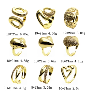 Collection of 14k gold plated adjustable rings with zircon heart and religious motifs