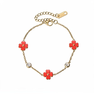 Pulsera de acero inoxidable dorado con tréboles de cuatro hojas rojos y circonitas