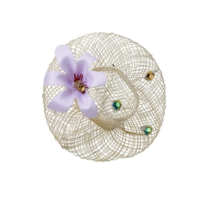 Exquisite woven gold sun hat jewelry with purple fabric flower and vibrant rhinestones