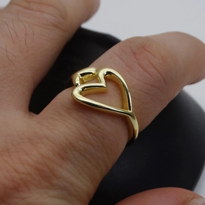 Close-up of 14k gold plated ring featuring a micro-paved zircon double heart design