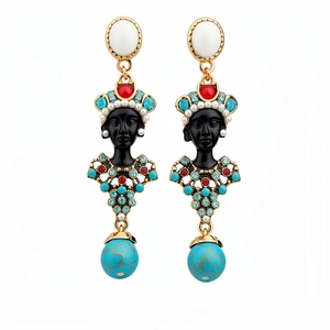 Exquisite vintage Blackamoor drop earrings featuring resin portraits and textured turquoise beads